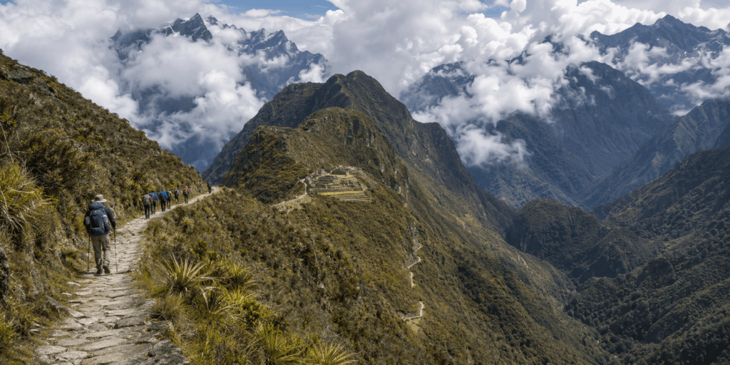 "Inca Trail difficulty 2026 — trekkers hiking the classic route through the Andes mountains toward Machu Picchu"